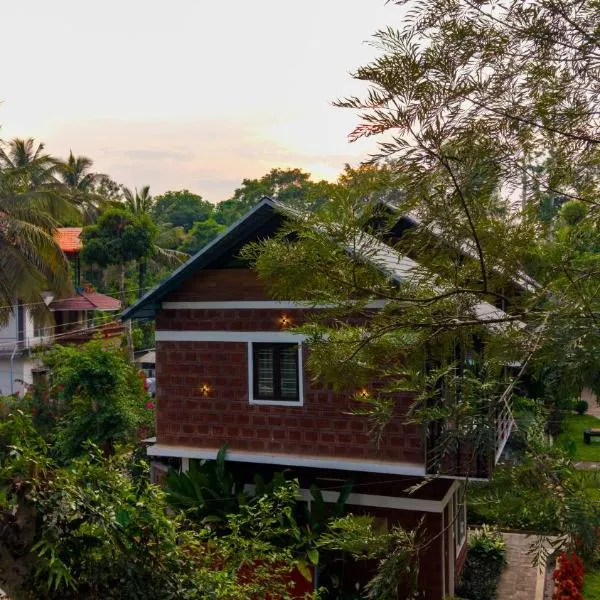 Viesnīca Avocado Cottages by Alaya Stays, Coorg pilsētā Suntikoppa