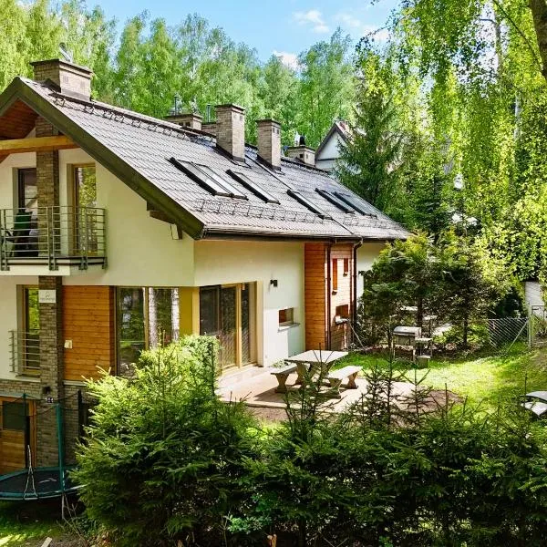 Mazursko - komfortowe apartamenty nad jeziorem, sauna, kominki na parterze, hotel sa Kretowiny