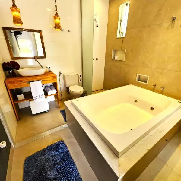 Villa Pella - Chalé Rosa- hidro e café manhã, hotel en Brumadinho