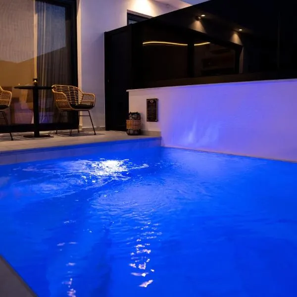 Black Diamond Airport Luxury Pool Suites, hotel en Artemida