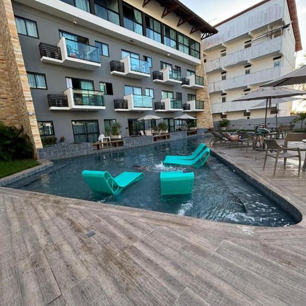 Flat completo a 7 min da praia e centro, wi-fi e piscina estilo resort