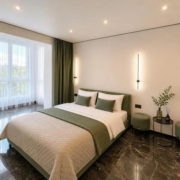 Сучасні апартаменти в новому ЖК Great House,район автовокзалу,центр,поруч обласна лікарня,парковка,автономне опалення,два окремі місця, khách sạn ở Rivne