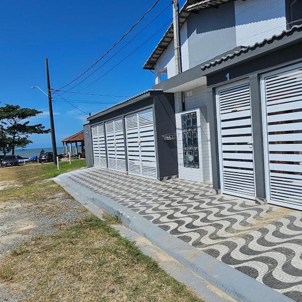 casa pé na areia itanhaém com piscina aquecida