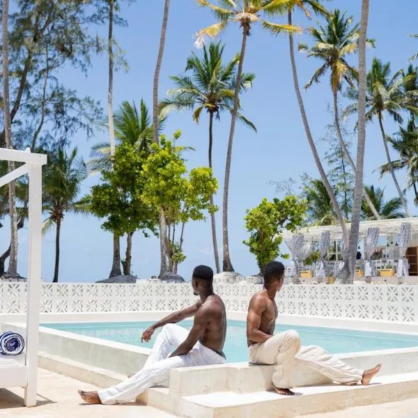 ZAN Orient Beach Hotel, hotel sa Dimbuni