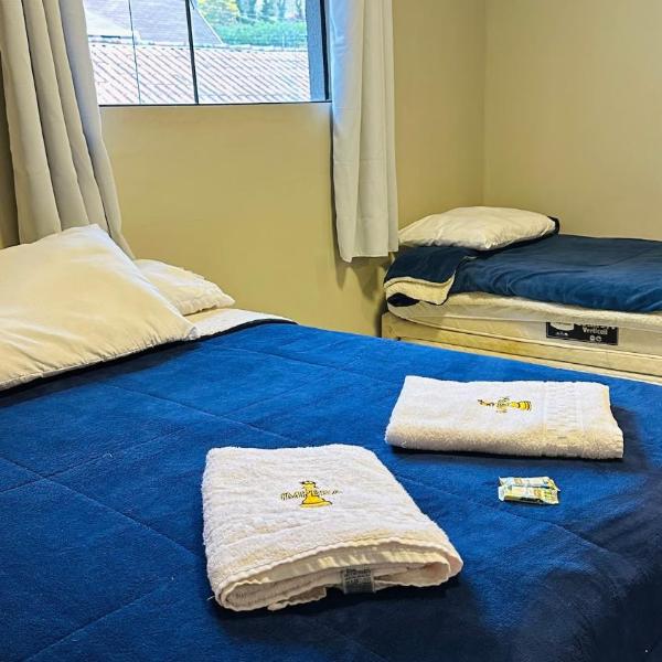 Quarto 15 · Suítes aconchegantes em Campos do Jordão, Suíte...