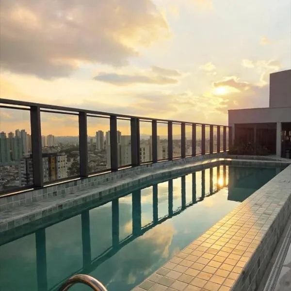 GRU SKY Studio, Novo, Alto Padrão, Self Check-in, Rooftop, a 10 minutos do aeroporto, hotel din Guarulhos