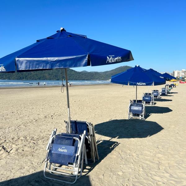 Helbor Atlantis ,Pé na Areia ,2 Quartos com Ar, Serviço de praia