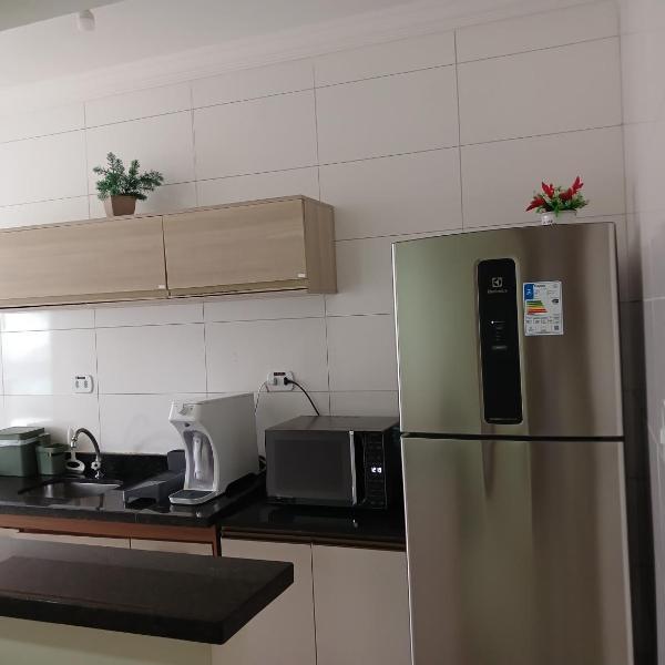 Charmoso apartamento pé na areia