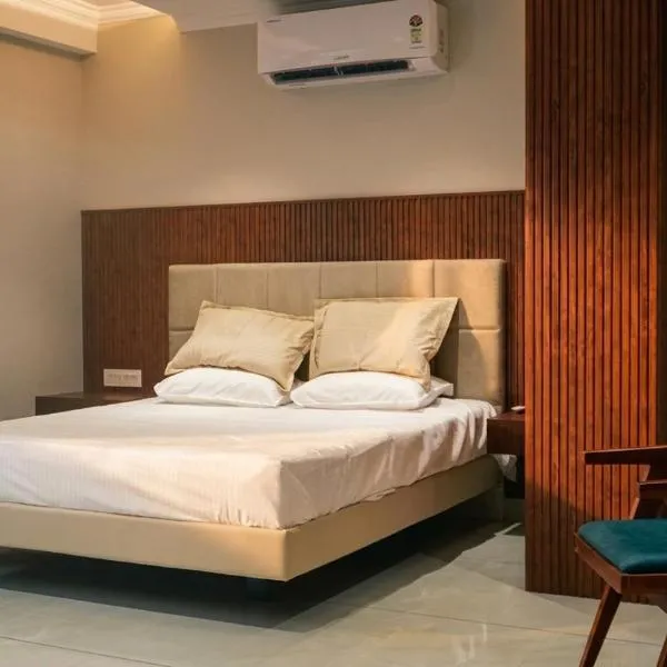 Oakleaf Residency, hotel din Tāzhekkod