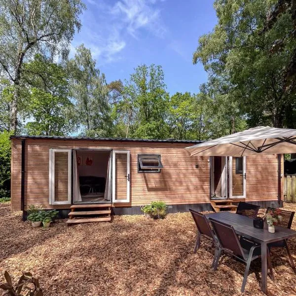 Atara Abode - Chalet voor 4 personen bij De Hoge Veluwe met tuin, מלון בהונדרלו