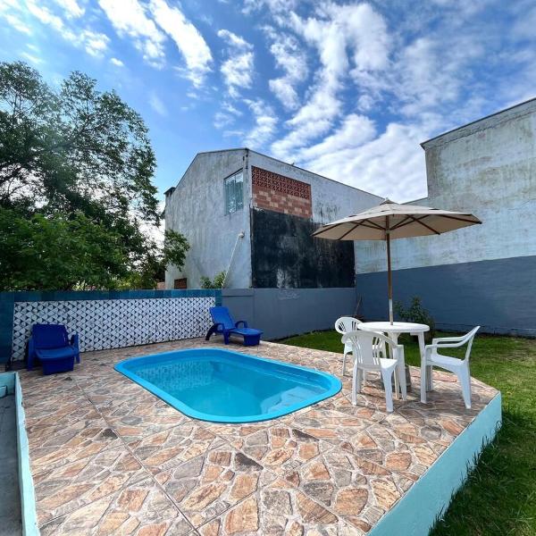 CASA COM PISCINA PARA TEMPORADA EM GUARATUBA Pr