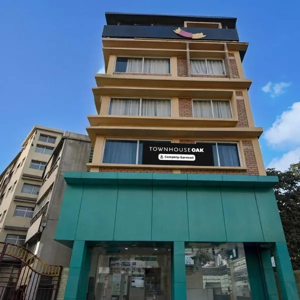Super Townhouse Oak Siliguri Formerly Palm Tree Lodge, hotel en Siliguri