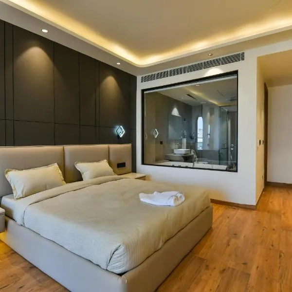 Melange Hotel - Golf course road, отель в Гургаоне