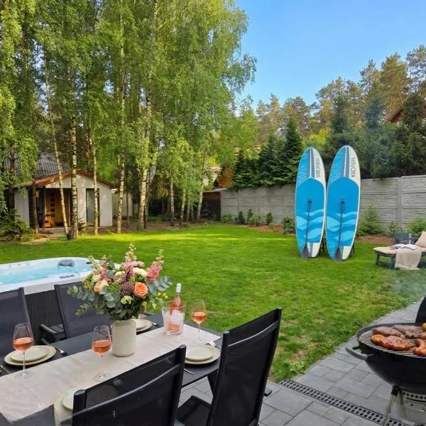 SAN ESCOBAR sauna jacuzzi jezioro, khách sạn ở Rogowo