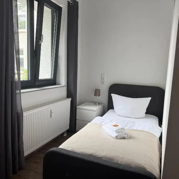 BIELEFELD CITY APARTMENTS - komfortable Einzelzimmer und Doppelzimmer - moderne Badezimmer, schnelles WLAN, Self-Check-In, hotel in Bielefeld