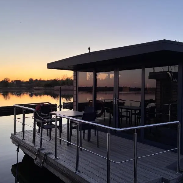 Hausboot Fjord Ankerplatz mit Biosauna in Schleswig – hotel w mieście Szlezwik