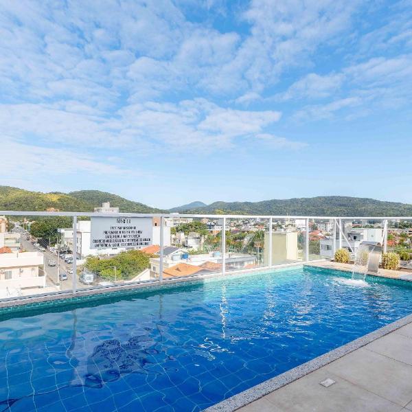 Apartamento com piscina e vista para montanha