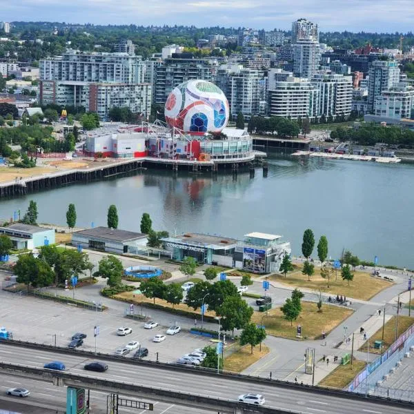 Walking distance to BC Place, modern High-Rise 1 Bedroom Condo with free parking, near stadiums, hotel en Vancouver