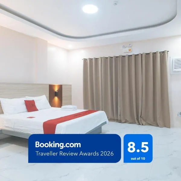 RedDoorz at Happy Stay Apartelle, hotell i Dauis