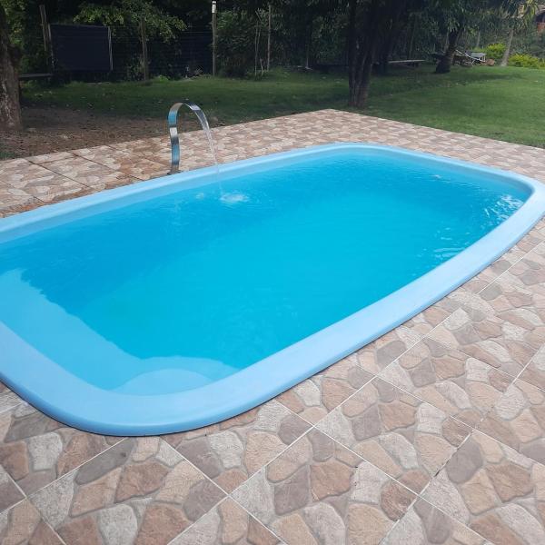 Sítio com 4 suítes, piscina e churrasqueira