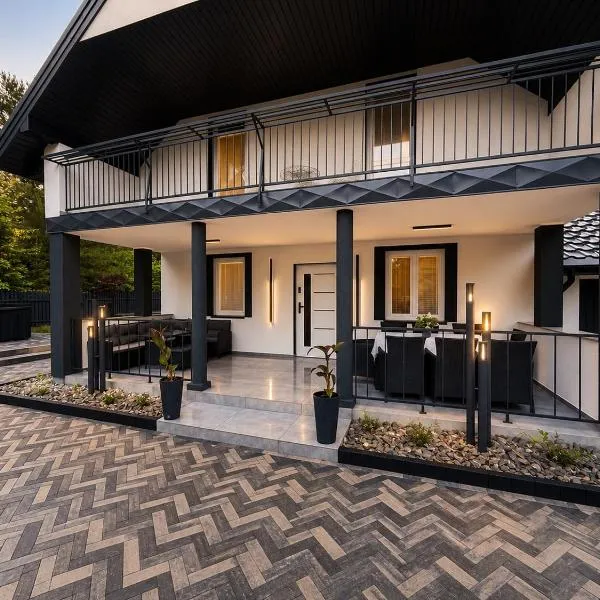 Magnolina - Dom całoroczny na Mazurach, hotel em Faryny