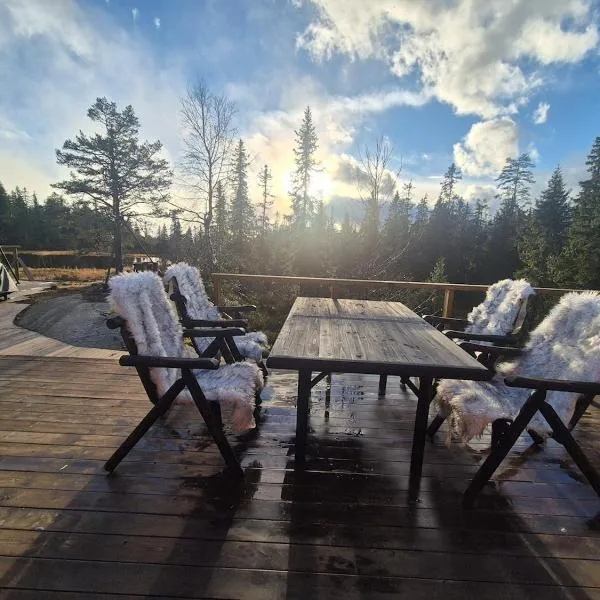Cabin with large terrace, hôtel à Nyhus