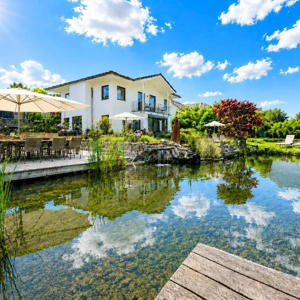 Schäfers - Ihr Wohlfühlort, Ferienwohnungen & Ferienhaus am Naturteich an 2 Seen bei Leipzig, Hotel in Großpösna
