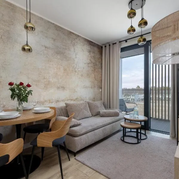 Klimatyzowane Apartamenty Art Lake w Mielnie z Parkingiem i Basenem by Noclegi Renters – hotel w mieście Mielno
