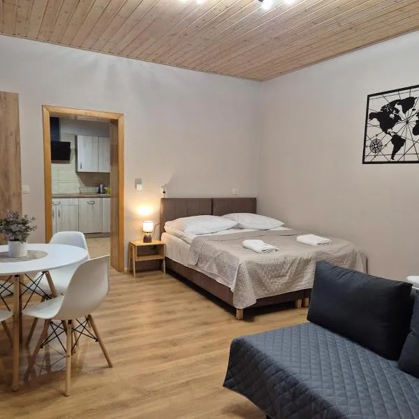 Apartment Pod Modrzewiem, хотел в Повидз