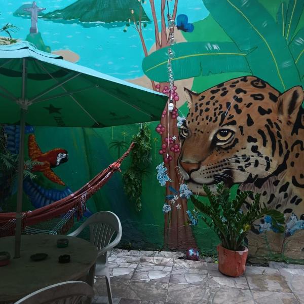 Quarto artístico com terraço em Botafogo