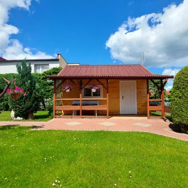 Drewniany Domek Letniskowy, hotel in Ruciane-Nida