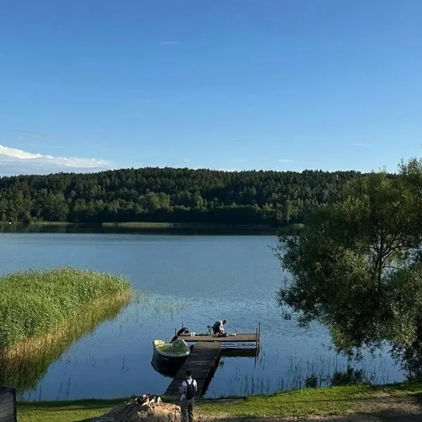 Domek nad Brzegiem- 20m od jeziora, hôtel à Wiele