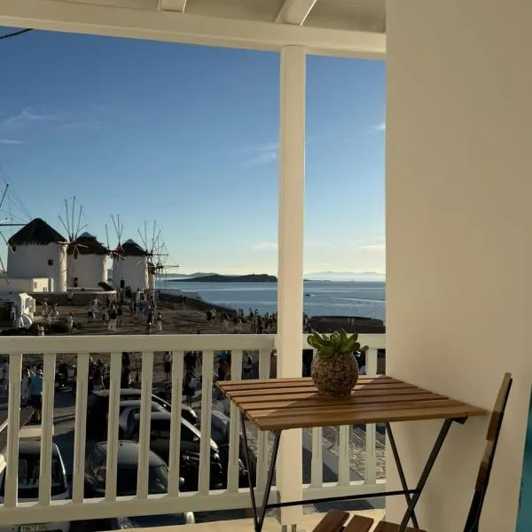 Luxury Living with Iconic Windmill & Sunset Views, hotel i Mykonos By