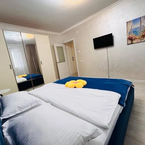 ЖК АЛМАЛЫ Комфортная однушка напротив Алматы Арена, hotel i Almaty