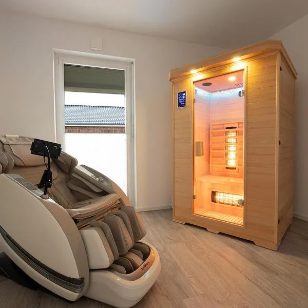 Sonne & Sand Strandnahes Ferienhaus mit Whirlpool, Sauna & Wallbox，比蘇姆的飯店