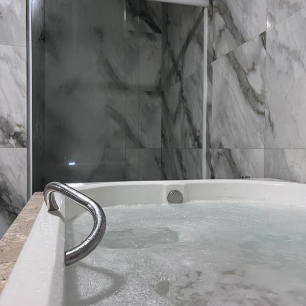 Casa com Hidromassagem Quente e Fria