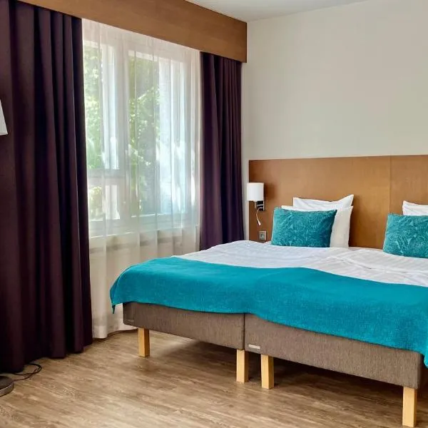 Hotel Raumanlinna, מלון בראומה