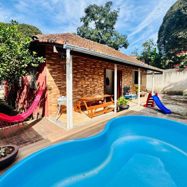 Casa com piscina com 4 quartos , 4 min do centro de carro