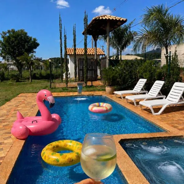 Sítio com piscina e hidromassagem em Igarapé, hótel í Igarapé