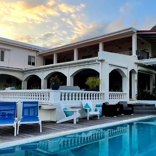 Quill Gardens Boutique Hotel, hotel di Oranjestad