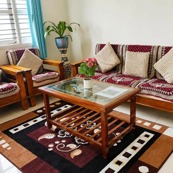 Neartown Homestay، فندق في كوشالناغار