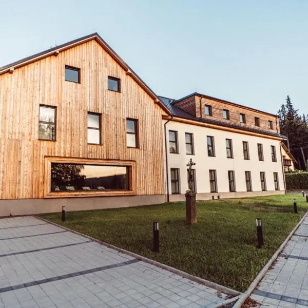 Apartmán U Brouka Javorná na Šumavě โรงแรมในČachrov