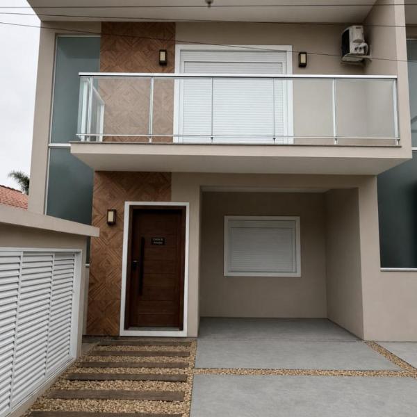 Casa Pé na Areia Praia da Ferrugem - 2 Vagas