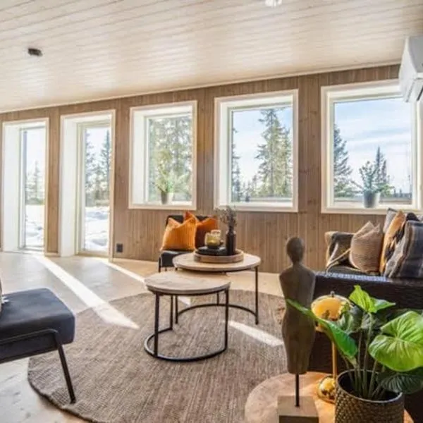 Ny hytte nära Bittermarka, vandring och cykling, hundar välkomna!, hotel in Trysil