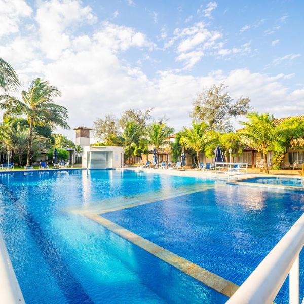 300m da Praia, casa 4 suítes, churrasqueira em Condomínio.