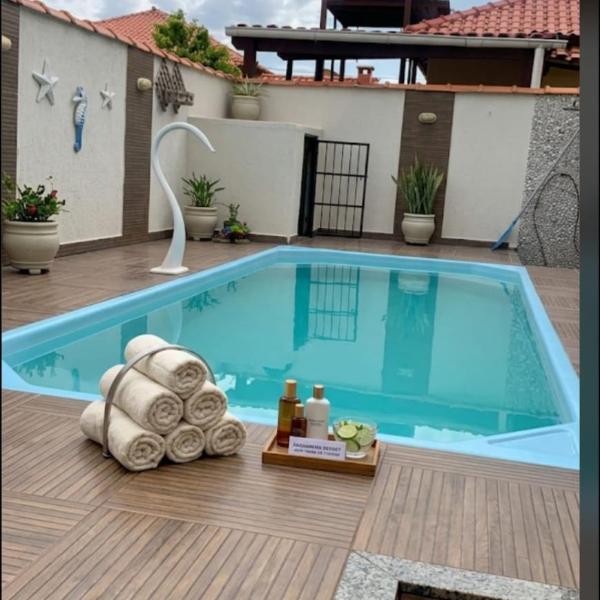 Casa com piscina e área gourmet próximo à praia com quarto suíte privativo - Foto 3