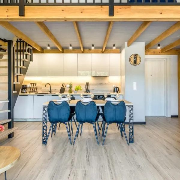 Viesnīca JANTAR RESORT Apartamenty PIAMOLA ze strefą sportową i grillem pilsētā Jantara