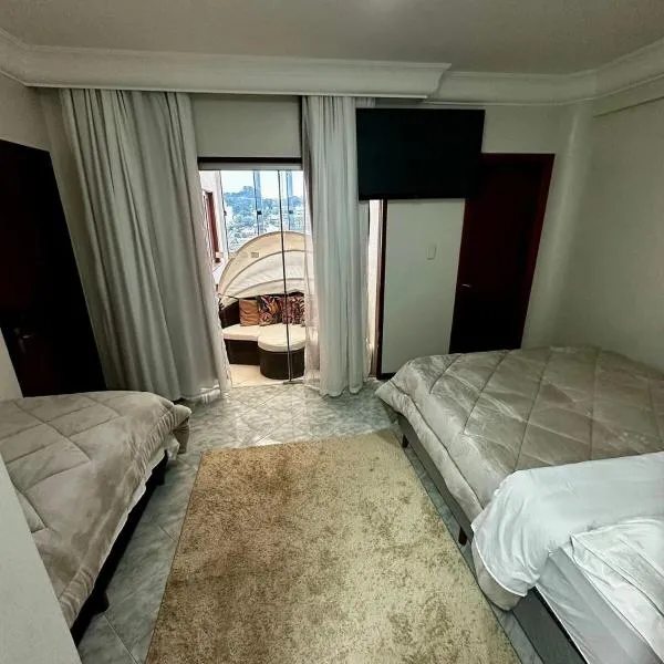 Loft Lux SM Chapecó Suíte Master, hotel u gradu Šapeko