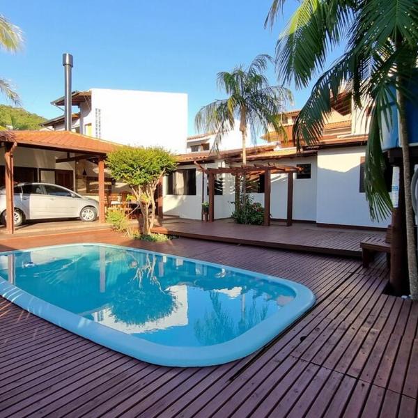 Casa Térrea com piscina, área gourmet com churrasqueira e quartos com ar condicionado - Foto 4