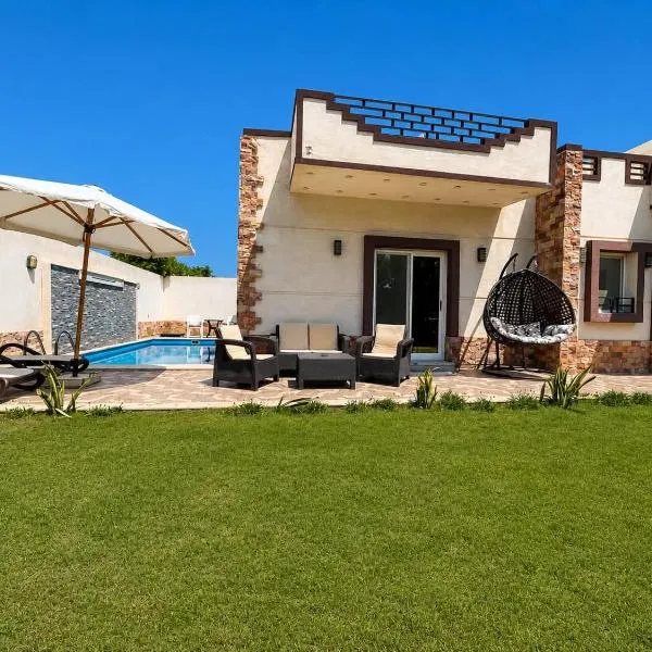 Nubian Villa with Private Pool, hotel din Naj‘ al Aḩwāl